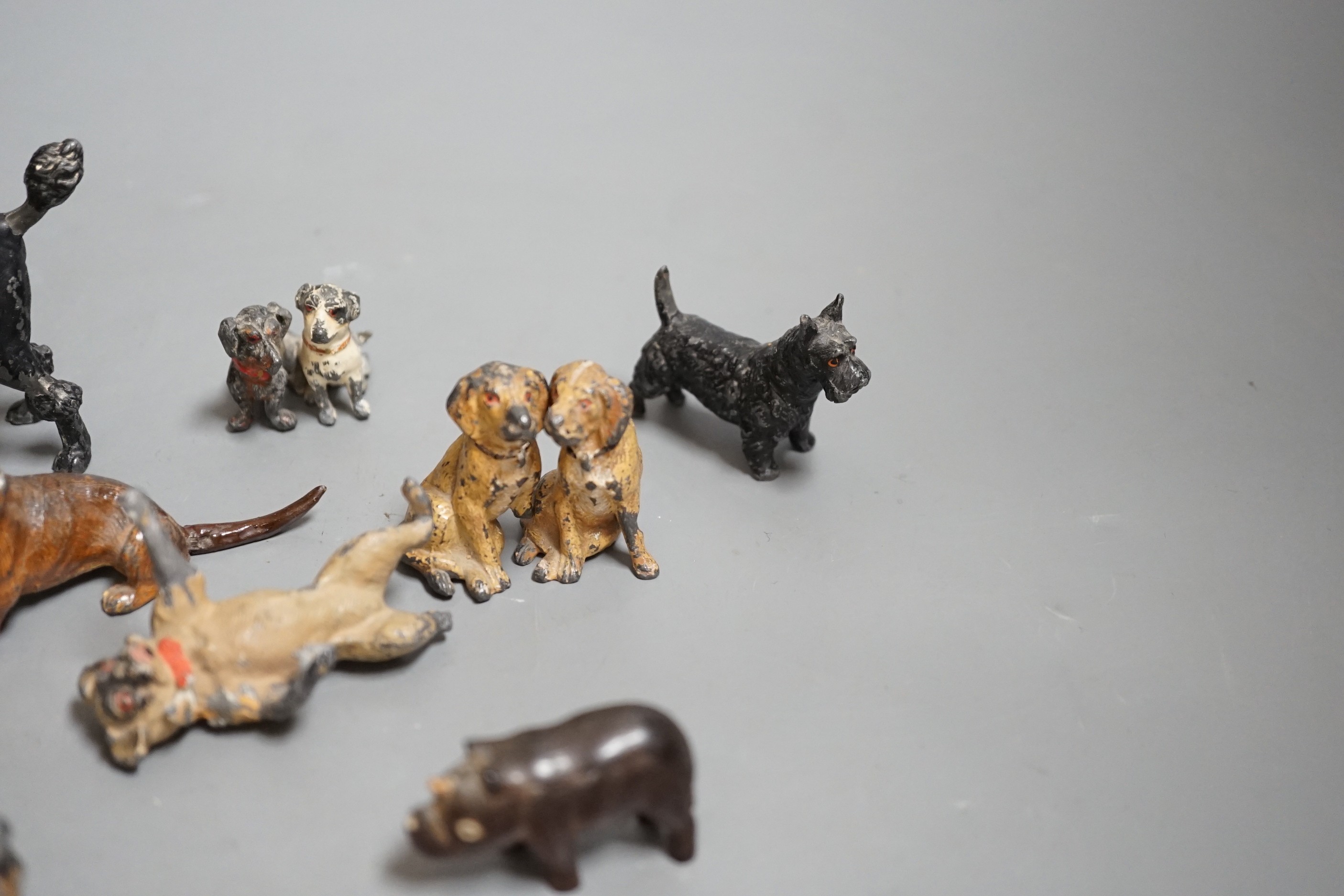 A small collection painted cast metal figures, dogs, to include ‘dancing dogs’, (group)